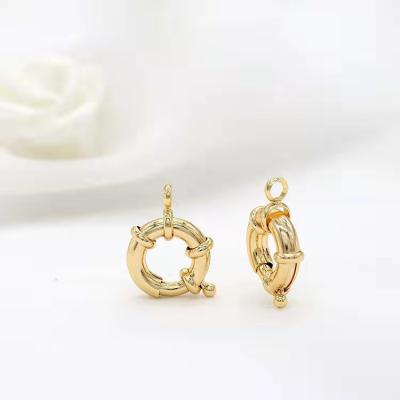 China TRENDY gold plated alloy twisted style spiral circles loop earrings for women girls big cc circle punk earrings for sale