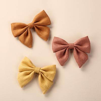 China Hair Accessories 8.5*6.5cm Fable Girls Knot Bows Hair Clips New Fashion Kids Canvas Bows Swallow Snail Hair Pins Kids Hair Accessories for sale