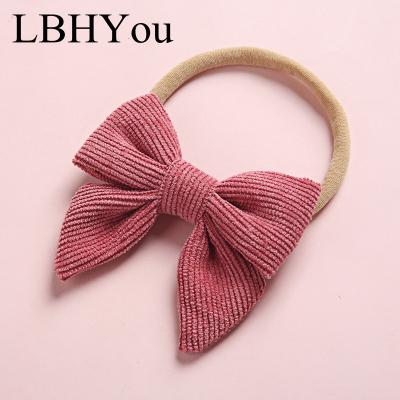 China New Elastic 20 Colors Babies Corduroy Knot Hangers Infants Colorful Girl's Elastic Nylon Tie Headbands Hand Traceless Nylon Headbands for sale