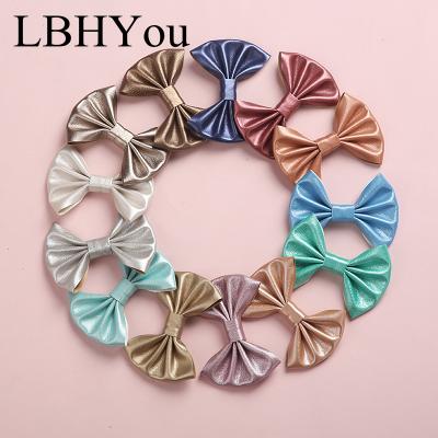 China Lowest Price Elastic School Girls PU Leather Hand Tie Hair Clips Kids Knot Girl's Bows Hairpins Hair Barrettes For Kids for sale