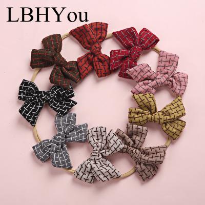 China 2020 new elastic knitted bows nylon headbands newborn babies tie head wraps elastic nylon headbands for sale