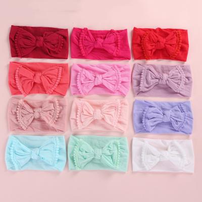 China 2019 Fashion New Fashion Hair Accessory Tassel Elasticity Band Pom Pom Cute Baby Hair Trim Headband Turban Nylon Head Wraps for sale