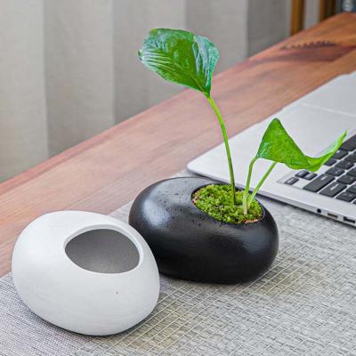 China Small Cute Creative Simple Stone Vase Small Stone Vase Decoration Mini Zen Home Decoration Flower Arrangement for sale