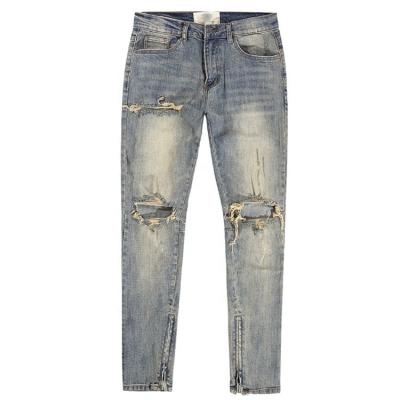 China Custom Style Light Blue Mens QUICK DRY Factory Street Jeans With Big Holes And Small Feet for sale