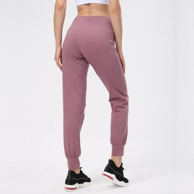 China High Waist Women Feel Pocket Sports Loose Bare Pants Leisure Breathable Wholesale Trousers for sale