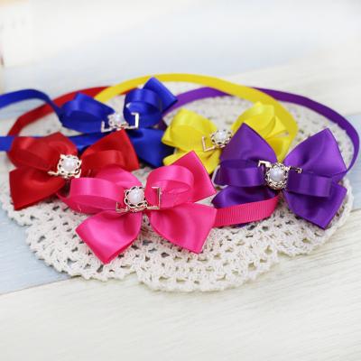 China Classic Pearl Stocked Lovely Pet Puppy Hair Hangers Elastic Hairpin Accessories Belt Dog Grooming Bows for sale