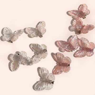 China Korean Transparent Hairpins Resin Hairpins Cute Glitter Color Hair Decoration Gradient Butterfly Platypus Hair Clip Female Acrylic Hair Clips for sale