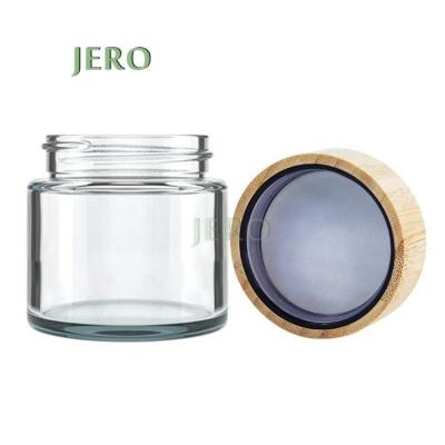 China Child Resistant Screw Cap CRC Child Resistance Can Eco-Friendly Lid 60ml Bamboo Child Resistant Glass Jar for sale