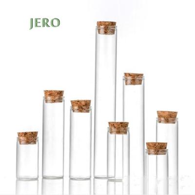 China Custom screw cap child resistant wooden glass tube kid cap heavy duty cbd pre roll tubes clear glass aluminum pre roll tube for sale