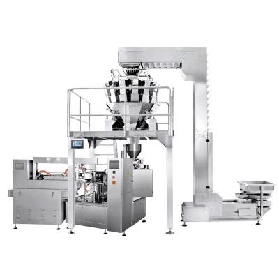 China Multi-function rotary vacuum packaging and weighing system JW-B10 for candy melon seeds jelly frozen en venta