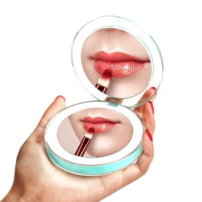 China Modern LED Mini Makeup Mirror 3X Magnify Handheld Fold LED Portable Mirror Beauty Cosmetic Mirror for sale