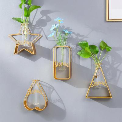 China Hydroponic line iron florero modern home wall hanging mini vase plant vase iron line nordic gold minimalist metal flower stand decor for sale