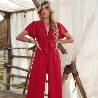 China Hot Sale QUICK DRY Women's Drop Ruffle Sexy Jumpsuits V Neck Ruffle Deep Sleeve Belted Wide Leg Overalls for sale