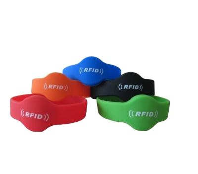 China Wholesale Custom MINI TAG Logo Smart Wristbands Soft Silicone RFID Silicon Wristband for sale