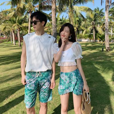 China New Couples Beach Wear Vacation Swimwear and Men's Anti-UV Trunks (one set including women's skirt and men's boxer) for sale