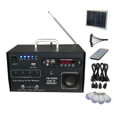 China 20w 40w Lithium Ion Battery Portable Solar System Home Lighting Kit All In One With FM Radio Player for sale