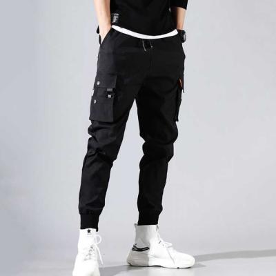 China Black Anti-Wrinkle Sports Fitness Multi Waist Drawstring Cargo Pants Trousers Men for sale