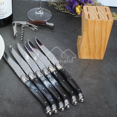 China Sustainable Creative Cutlery Stainless Steel Serrated Steak Knife With Marble Effect Handle for sale