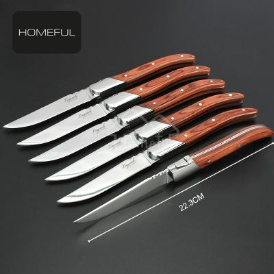 China Durable high quality stainless steel serrated steak knife with pakka wook handle for sale