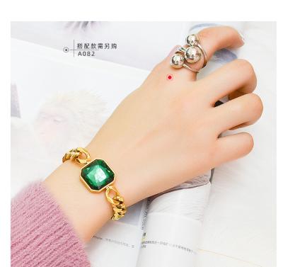 China Hiphop Kosta Factory Outlet Party Hiphop Titanium Gold Plated Women's Charm Bracelets for sale