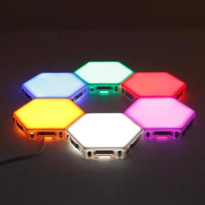 China ABS Holiday Light Diy Assembled Magnetic Hexagonal Hexagonal Honeycomb Wall Lamp Hexagon Modular Touchless Night Light for sale