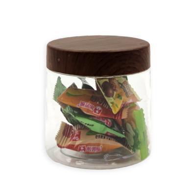 China Clear Plastic Food Container Food Candy Packaging 200ml Clear Pet Plastic Jar Containers With Wooden Lid for sale