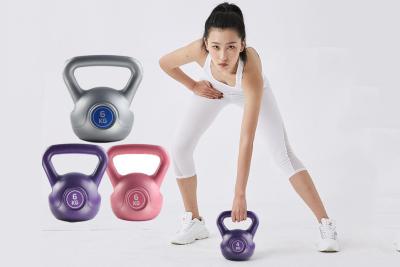 China Las pesas de gimnasia libres amistosas multicoloras de la caldera del peso cementan el gris púrpura rosado de Kettlebells en venta