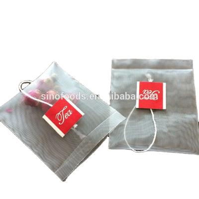 China Triangle Corners Tea Bag Private Label Tea Pyramid Aseptic Empty Nylon Paper Tea Bag for sale