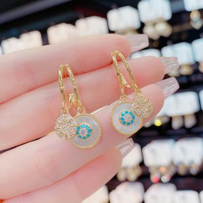 China Punk The Girl Of The Sea Star Of The Sea Zircon Shell Silver Needle Micro-encrusted Micro-needle Personality All-match Disc Earrings s925 for sale