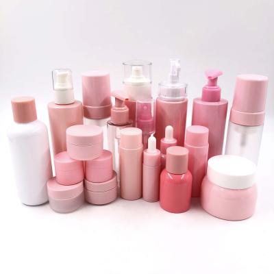 China Custom High Quality 100ml 60ml Cosmetics Packaging Cosmetics Pink Purple Toner Bottle Refillable Skin Care Cream PP 10g 20g Jars Set for sale