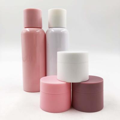 China Personal Skin Care Packaging Cosmetic Container And Glossy PET Facial Toner Bottle Detergent Jars Set Round Pink Bottles Set For Cosmetic Packaging for sale