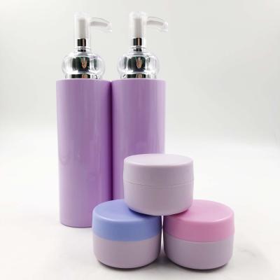 China Personal Skin Care Packaging Luxury Purple PET Bottle Body Lotion Bottle Cosmetic Lotion Container And Jars Set Face Cream Bottles Set For Cosmetic Packaging for sale