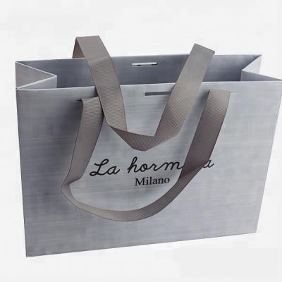 China Recyclable Custom Low Cost Simple Wholesale Paper Bag Gift Printing Bag for sale