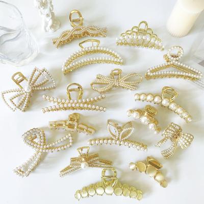 China 2021 fashion custom stone hair claw luxury big pearl metal hair clip claw for women for sale