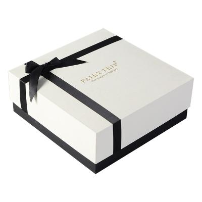 China Custom Logo High Quality Cardboard Paper Luxury Recyclable Two Pieces Rigid White Sliver Cosmetic Lid Apparel Boxes And Bottom Gift Box for sale