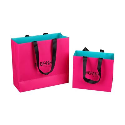 China Recycled Luxury Black Custom Printed Paper Bag Logo Jewelry Packaging Kraft Shopping Materials Gift Paper Bag With Ribbon Handles for sale