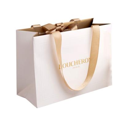 China Reused Materials White Paper Bag Birthday Party With Handle Black Rope Logo Printed High Quality Custom Gift White Paper Bag With Gold Rope for sale