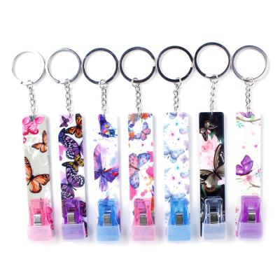 China Custom Logo Cute Acrylic Bank Card Promotional Hot Sale Gift Grabber For Women Key Chains Accessories Long Nails for sale