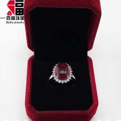 China FASHIONABLE Band Corundum Sunflower Ring 18K Gold Halo Gemstone 5# Oval 14*10mm Red Cabochon for sale