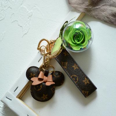 China Preserved Rose & Mickey Long Lasting Kunming Floral Factory Supply Souvenir Gift Shop Amazon Leather Wholesale Leather Animal Key Chains for sale