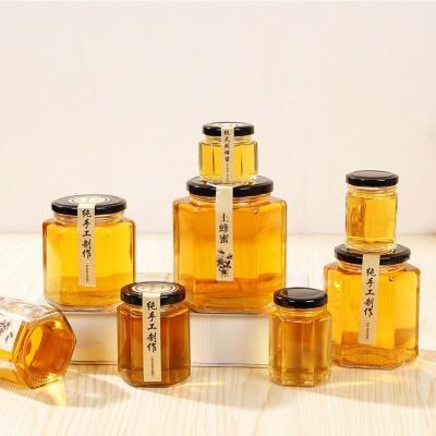 China Wholesale High Quality Hexagonal Shaped Honey Bottle 45ml 100ml 280ml 730ml Factory Freshness Preservation Hexagonal Shaped Glass Jar for sale