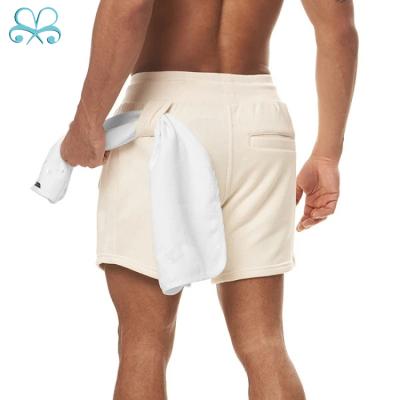 China QUICK DRY Fitness Shorts Men With More Pockets Hanging Towel Cotton Running Training Pants for sale