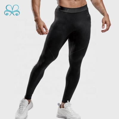 China Antibacterial Custom Logo Men Slim Fit Compression Gym Tights Sports Gaiters With Zipper Pocket for sale