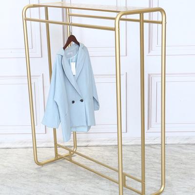 China Nordic double-sided bedroom clothing rack display floor store clothing rack simple gold hanging rack for sale