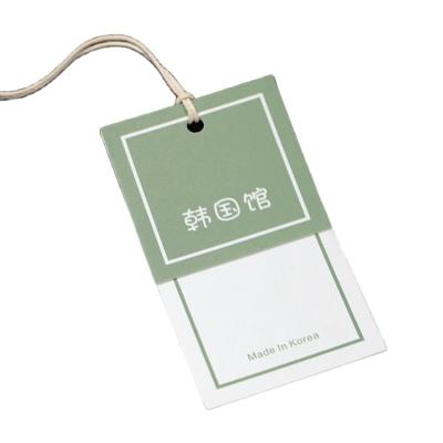 China Sustainable Custom Apparel Hang Tag Labels Garment Hang Tag With String Custom Apparel Tags for sale