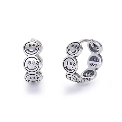 China Fashionable Cute Tiny Women's Smiley Face Huggie Small Hoop Earring for sale