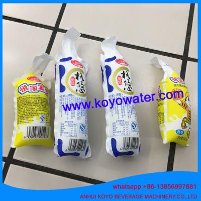 China dairy milk mini bag pouch filling sealing packing machine/peanut butter packaging machine for sale