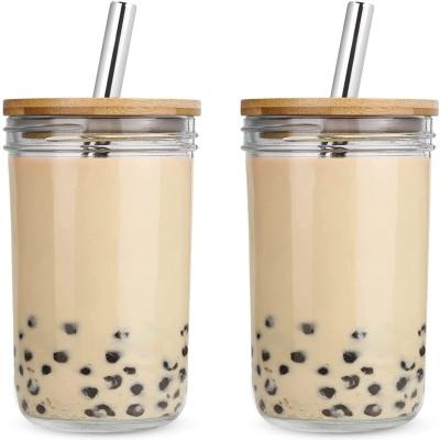 China Wholesale Stocked Coffee Mug Glass With Straw Water Bottle Glass Coffee Cup With Silicone Lid for sale