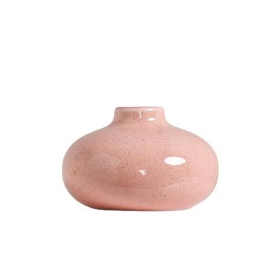 China Contemporary Nordic Central Institute of Statistics Bud Vase Pink Home Decoration Modern Mini Flower Ceramic Vases for sale