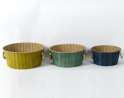 China Morden Hot Selling Oval Shape Iron Ceramics Basket Storage With Wooden Beads Handle for sale